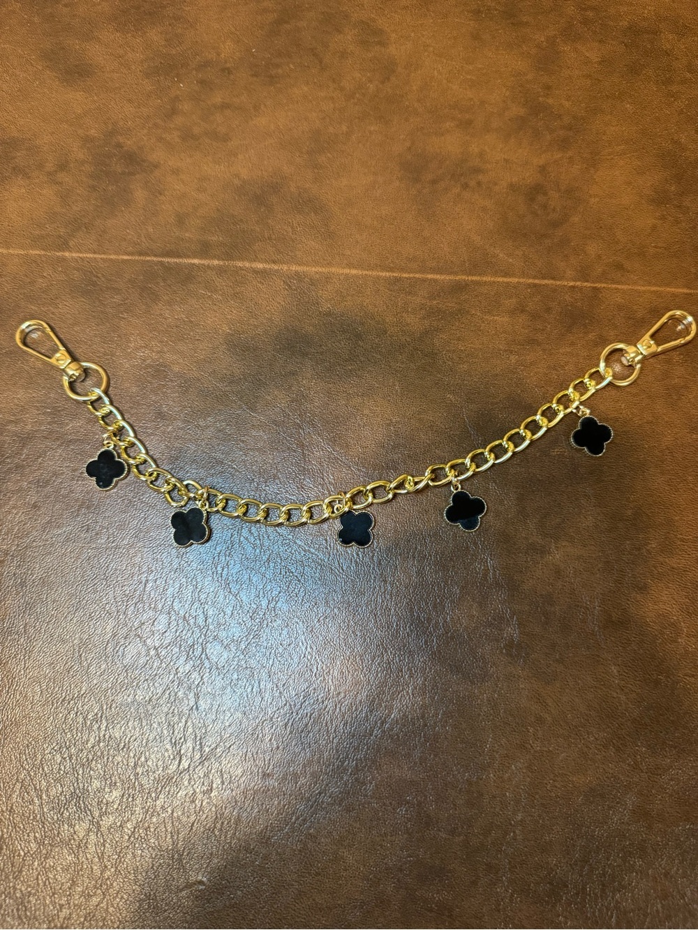 NWT Gold Link Bag Chain with Black Clover Charms